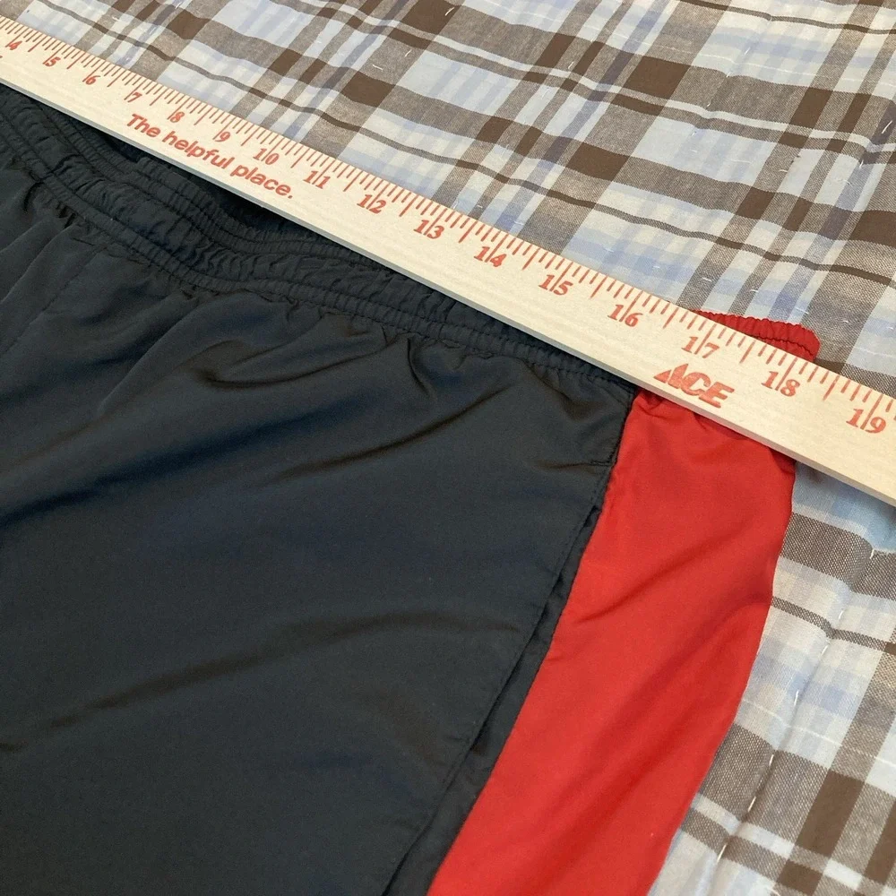 Under Armour Pants Men Medium M Windbreaker‎ Red Black Zip Ankles Stretch Track